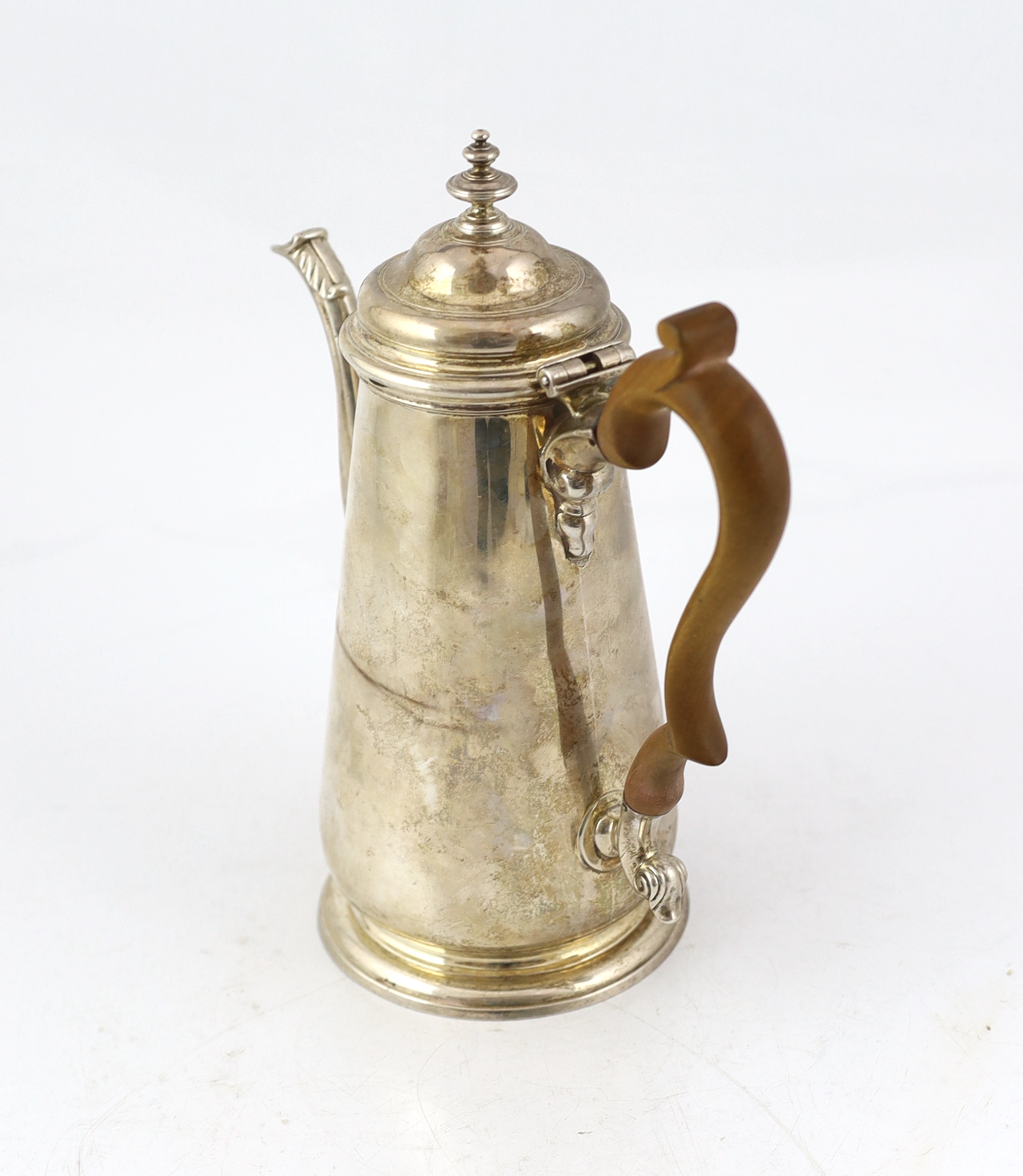 A George II silver coffee pot and hinged cover with turned finial, William Williams I